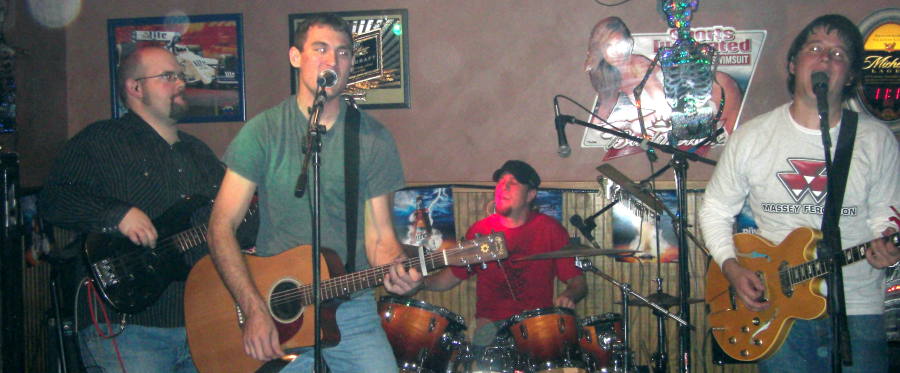 Aaron Traffas Band at the Plum Thicket in Kiowa on October 25, 2008 - left to right: Chris Goering, Lucas Maddy, Mason Powell, Aaron Traffas