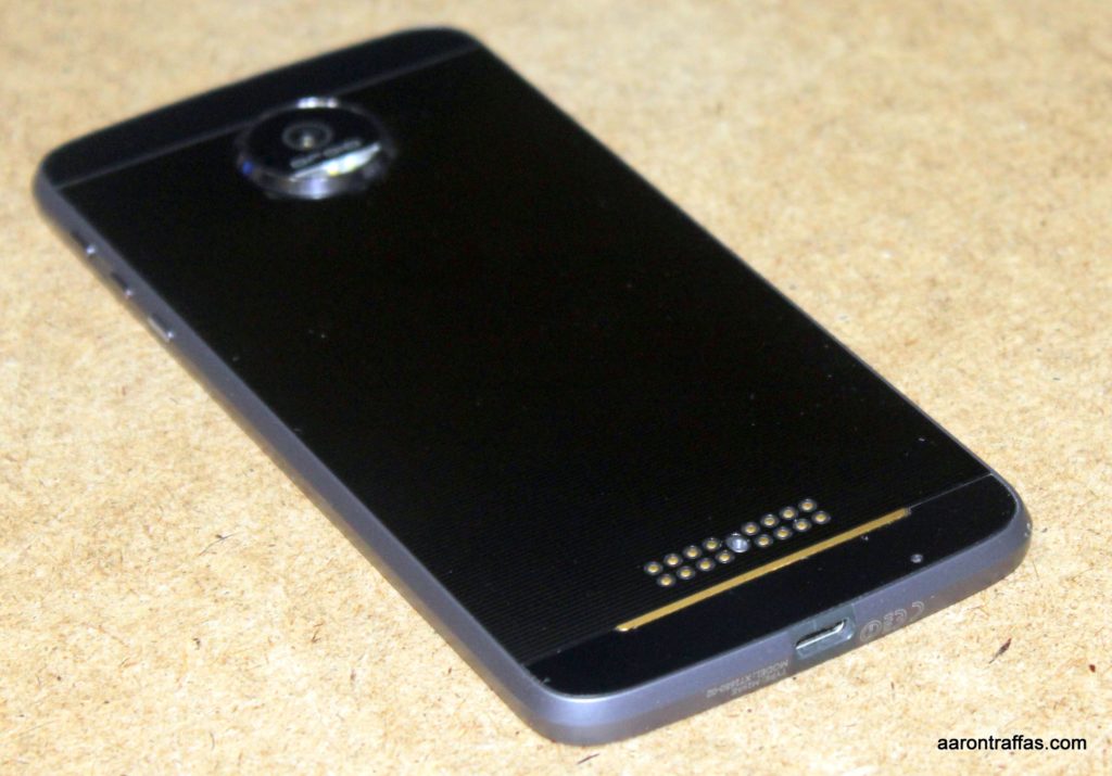 Moto Z Force with back removed showing connection pins