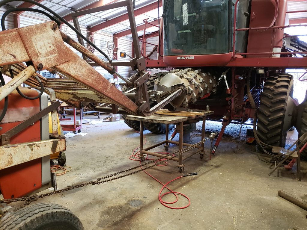 Putting the rotor back in the combine